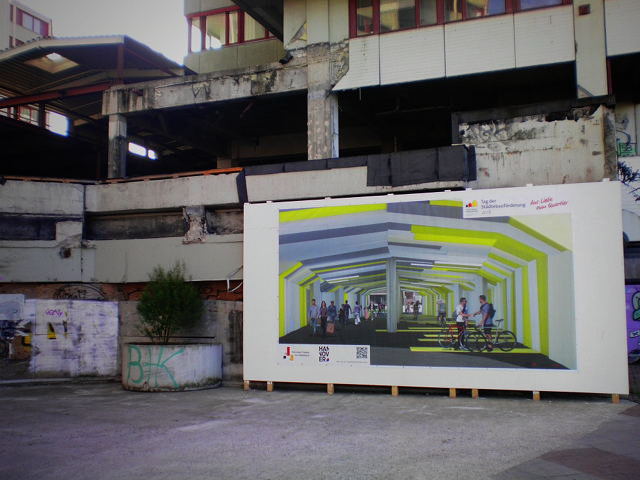 Großes Werbeplakat an der Ruine des Ihmezentrums: Tag der Städtebauförderung -- Aus Liebe zum Quartier